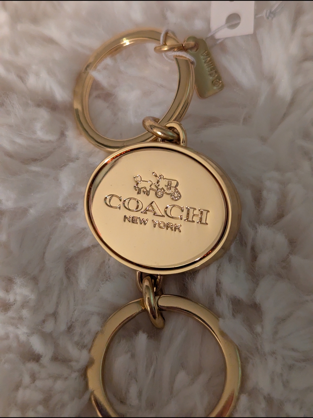 Coach Gold-Tone Signature Turnlock Valet Keychain - Picture 2 of 5